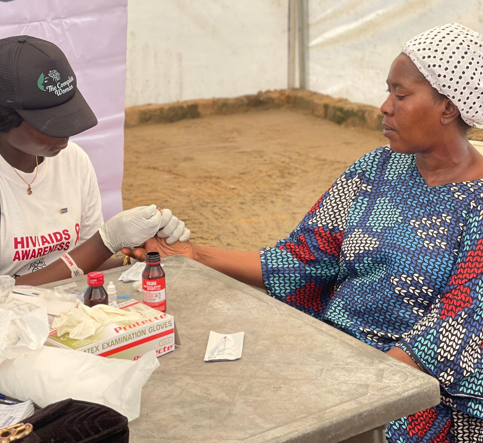 Health professionals speaking to a community group
